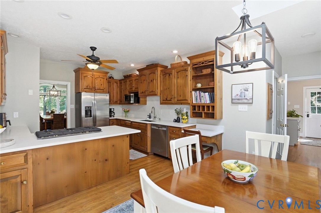 12123 Deer Ridge Court Ashland, VA 23005 - Photo 19 of 63 a large kitchen with a table and chairs