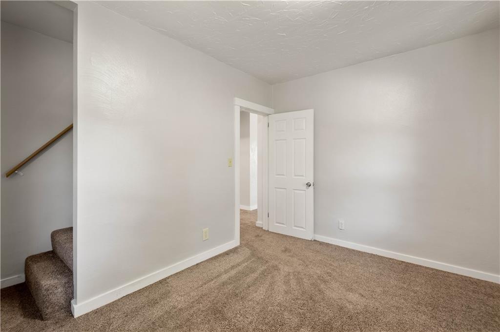 955 Boyce Road Bridgeville, PA 15017 - Photo 32 of 45 2nd bedroom with stairway to 3rd floor