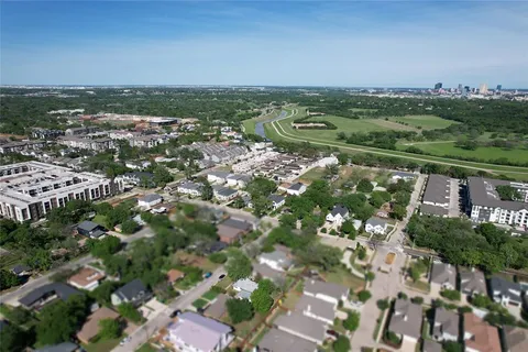 an aerial view of a city with lots of residential buildings