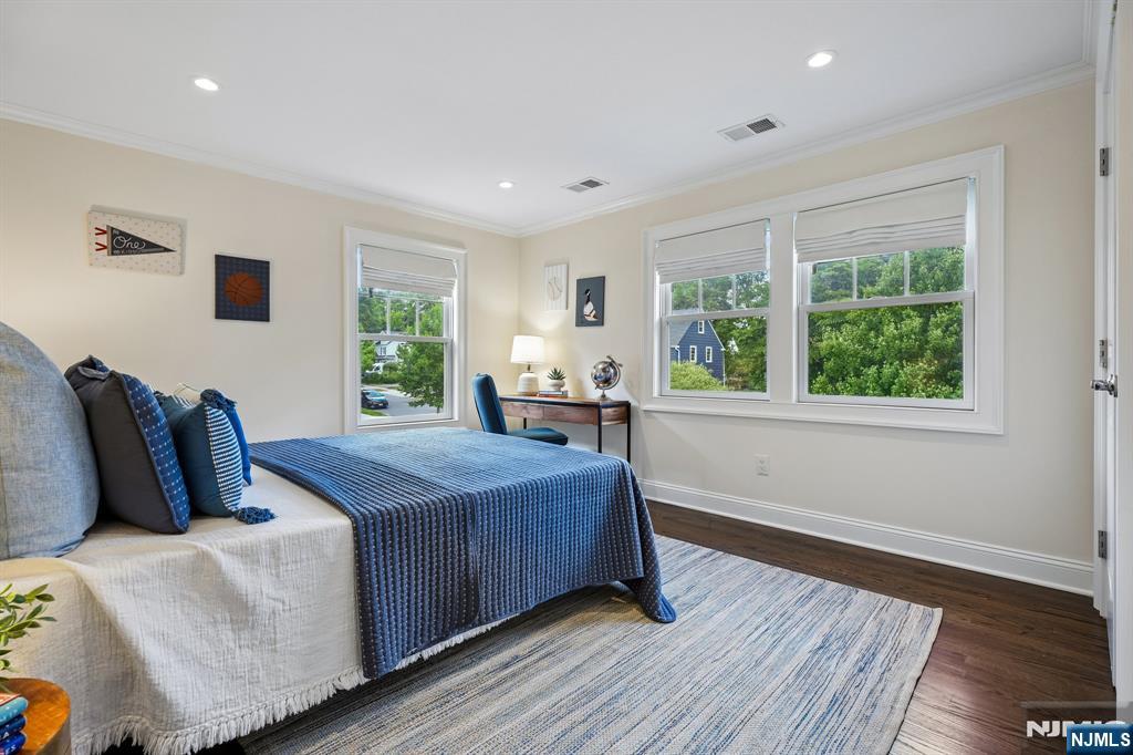 11 Mt Vernon Road Montclair, NJ 07043 - Photo 25 of 49 a bedroom with a bed and wooden floor
