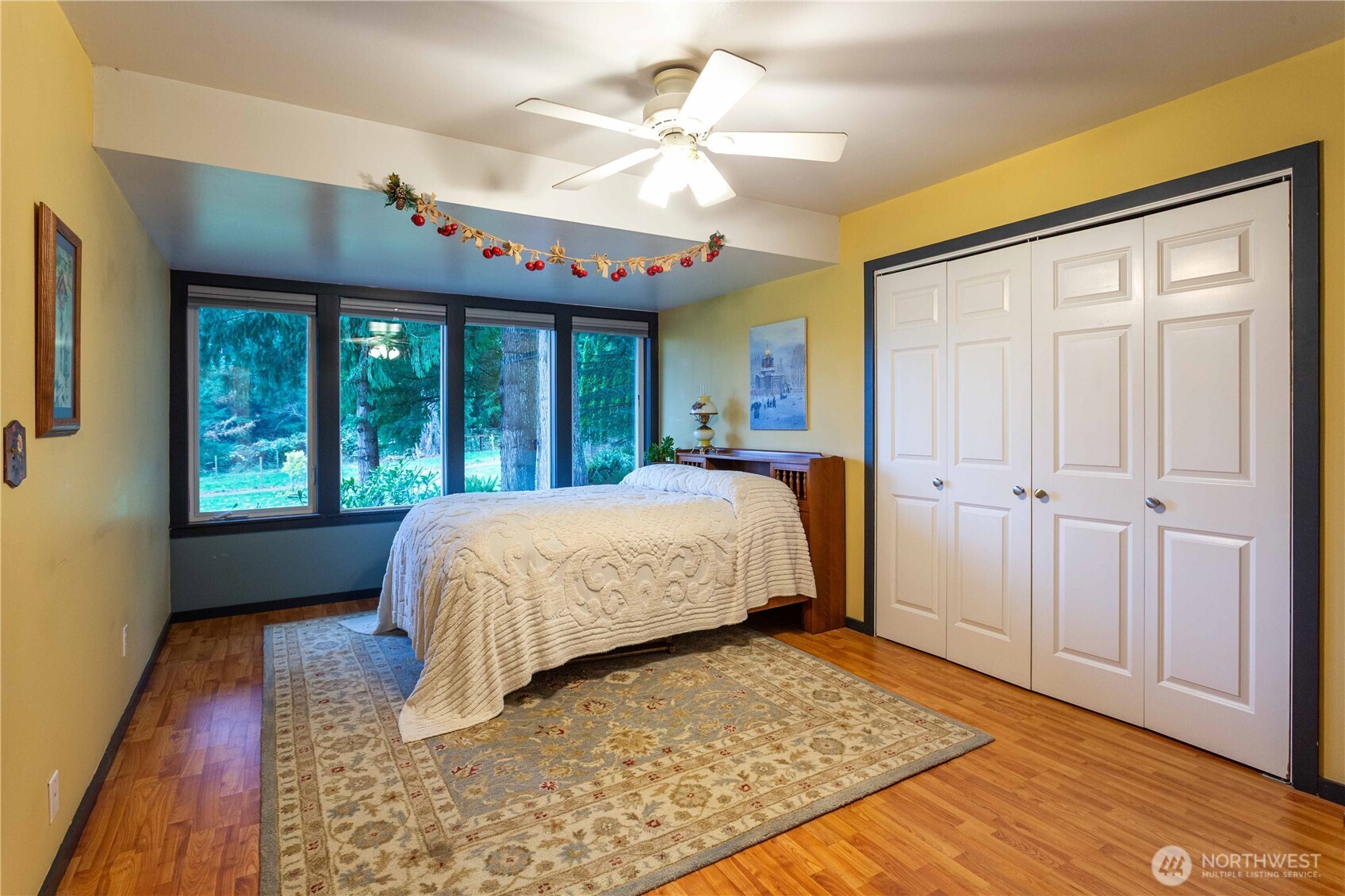 5363 Reese Hill Road Sumas, WA 98295 - Photo 18 of 40 a bed sitting in a spacious bedroom next to a window