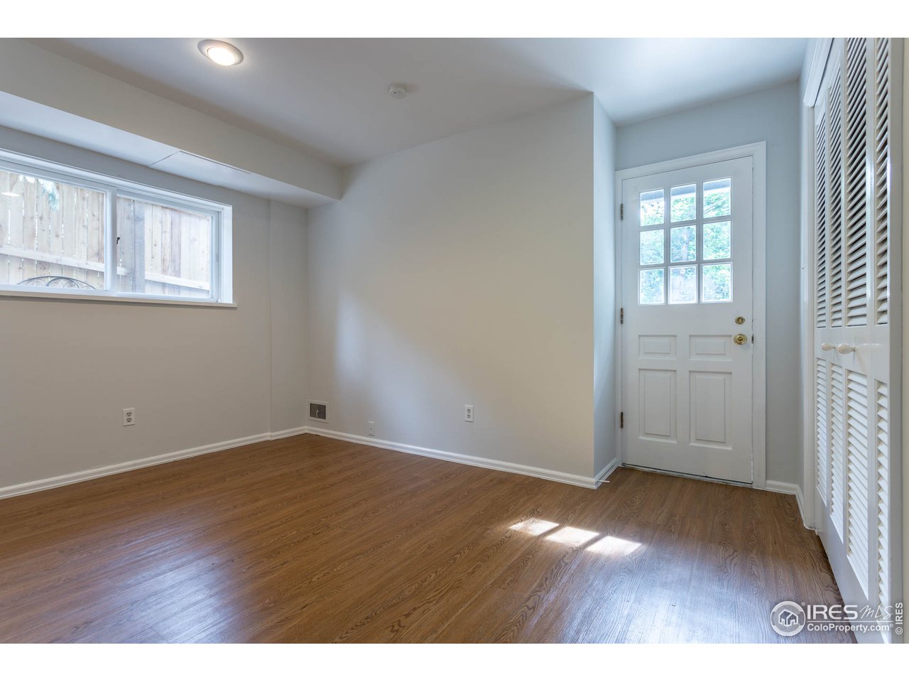 777 Willowbrook Road Boulder, CO 80302 - Photo 24 of 32 5th bedroom/flex space with door to exterior.