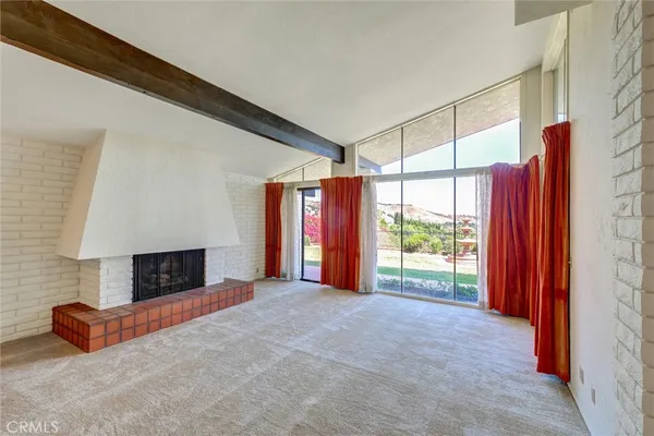 a kitchen with stainless steel appliances granite countertop a sink and a stove top oven