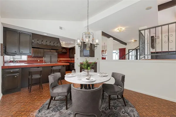 a view of a kitchen with a sink