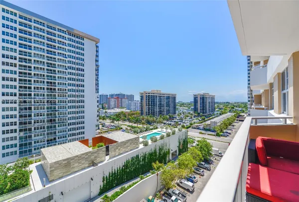 a view of a city with tall buildings