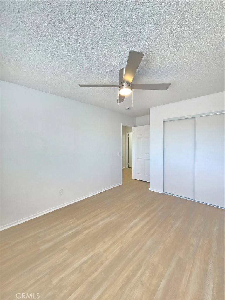 8249 Catalpa Avenue, Unit A California City, CA 93505 - Photo 9 of 12 a view of an empty room with a window