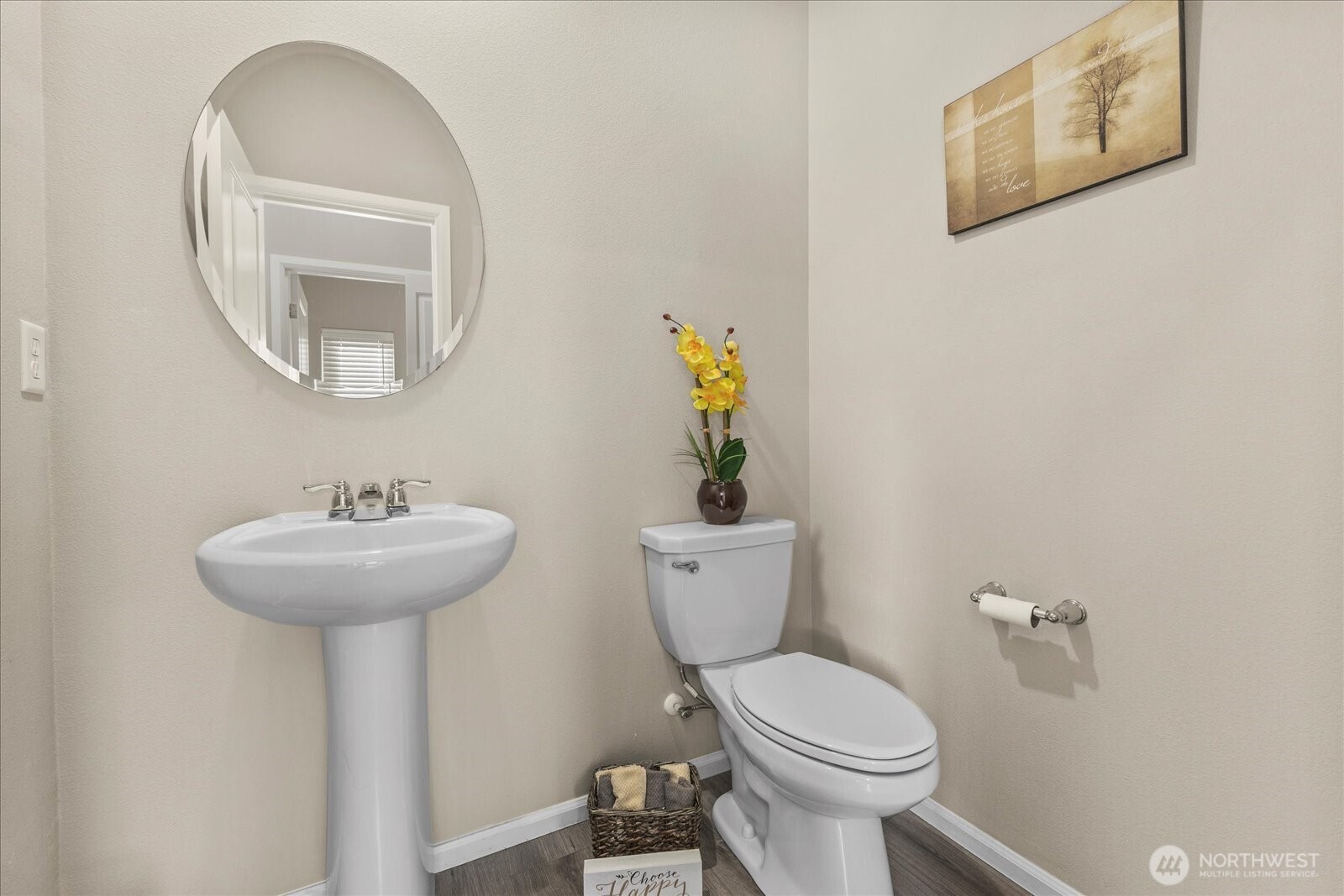 17401 118th Ave Court East, Unit A Puyallup, WA 98374 - Photo 11 of 25 a bathroom with a toilet a sink and a mirror