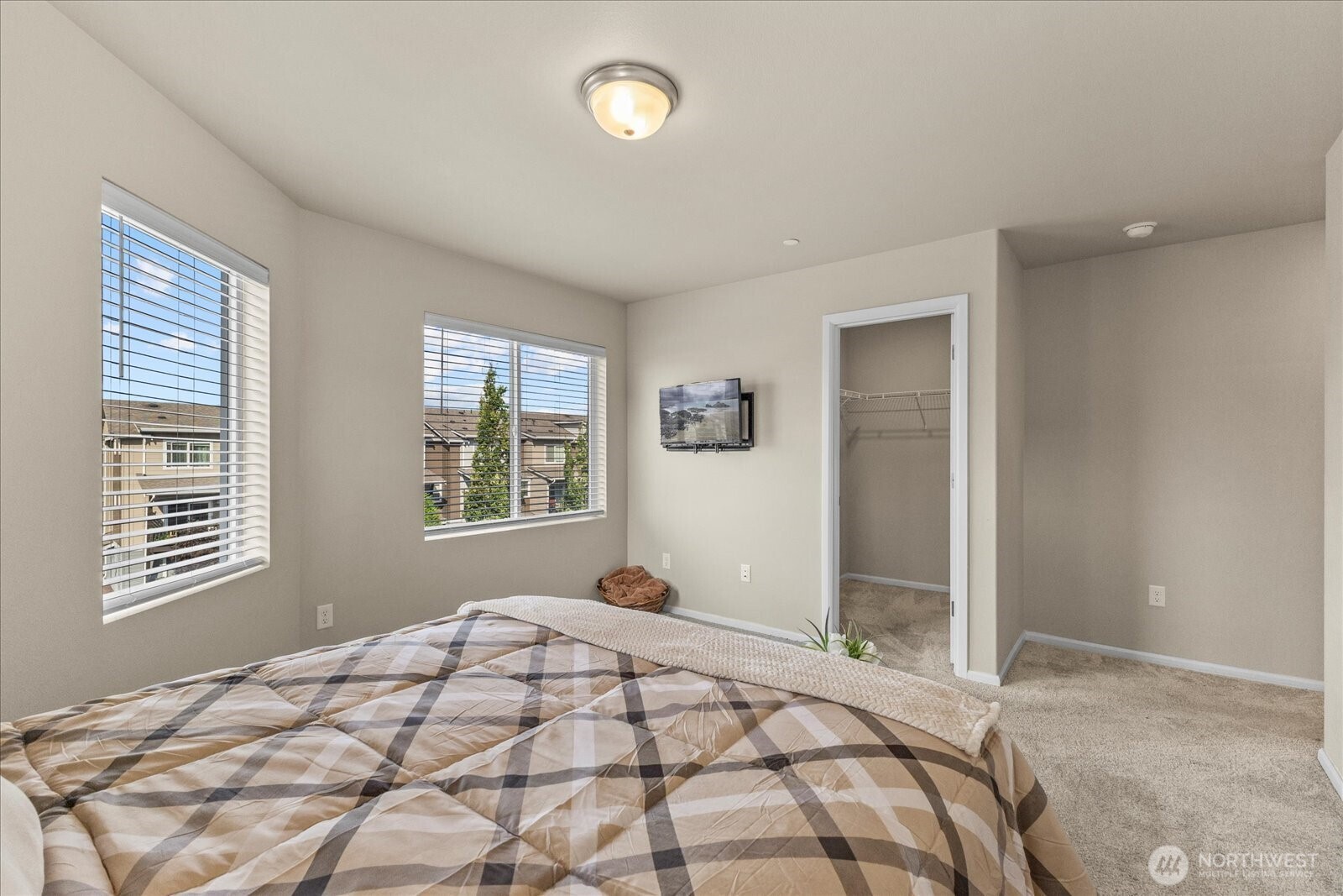 17401 118th Ave Court East, Unit A Puyallup, WA 98374 - Photo 14 of 25 a bedroom with a bed and a window