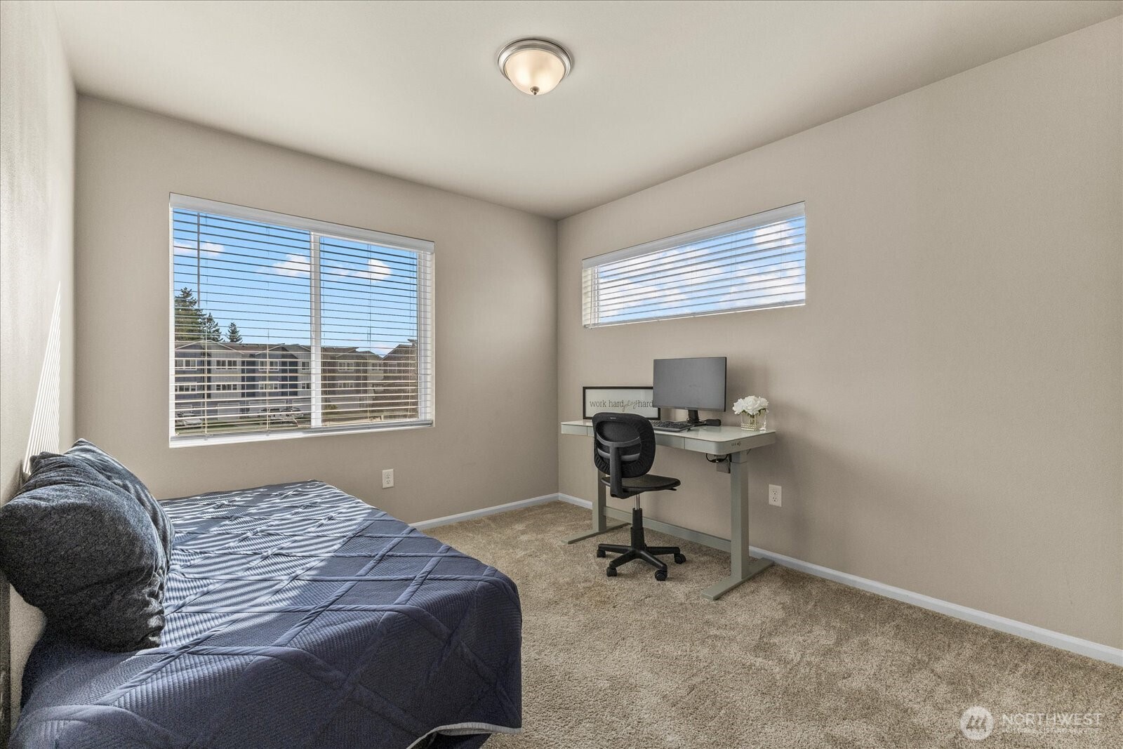 17401 118th Ave Court East, Unit A Puyallup, WA 98374 - Photo 17 of 25 a bedroom with a bed and a window