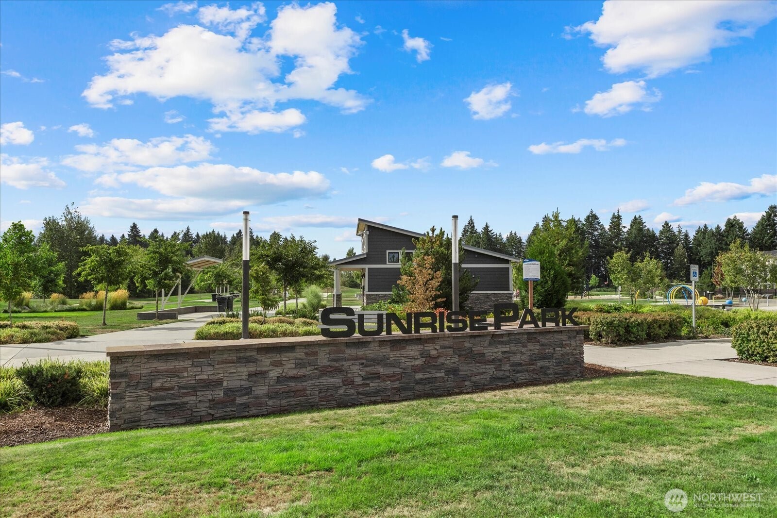 17401 118th Ave Court East, Unit A Puyallup, WA 98374 - Photo 22 of 25 a view of a yard with an tree