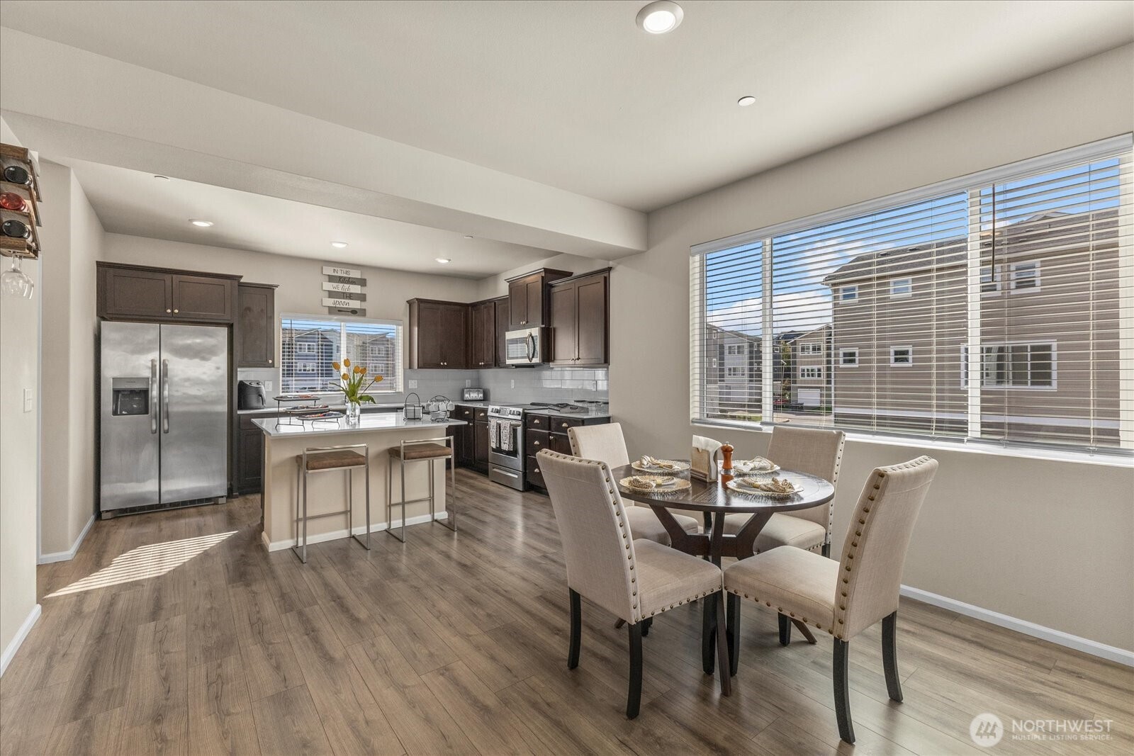 17401 118th Ave Court East, Unit A Puyallup, WA 98374 - Photo 3 of 25 a dining room with furniture and window