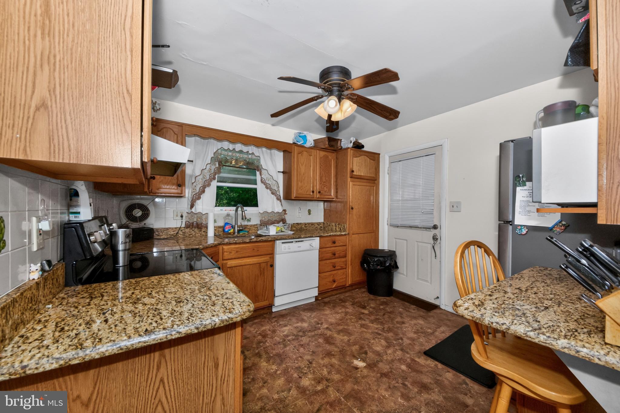 4920 Old Court Road Randallstown, MD 21133 - Photo 20 of 59 Kitchen + Side Entrance