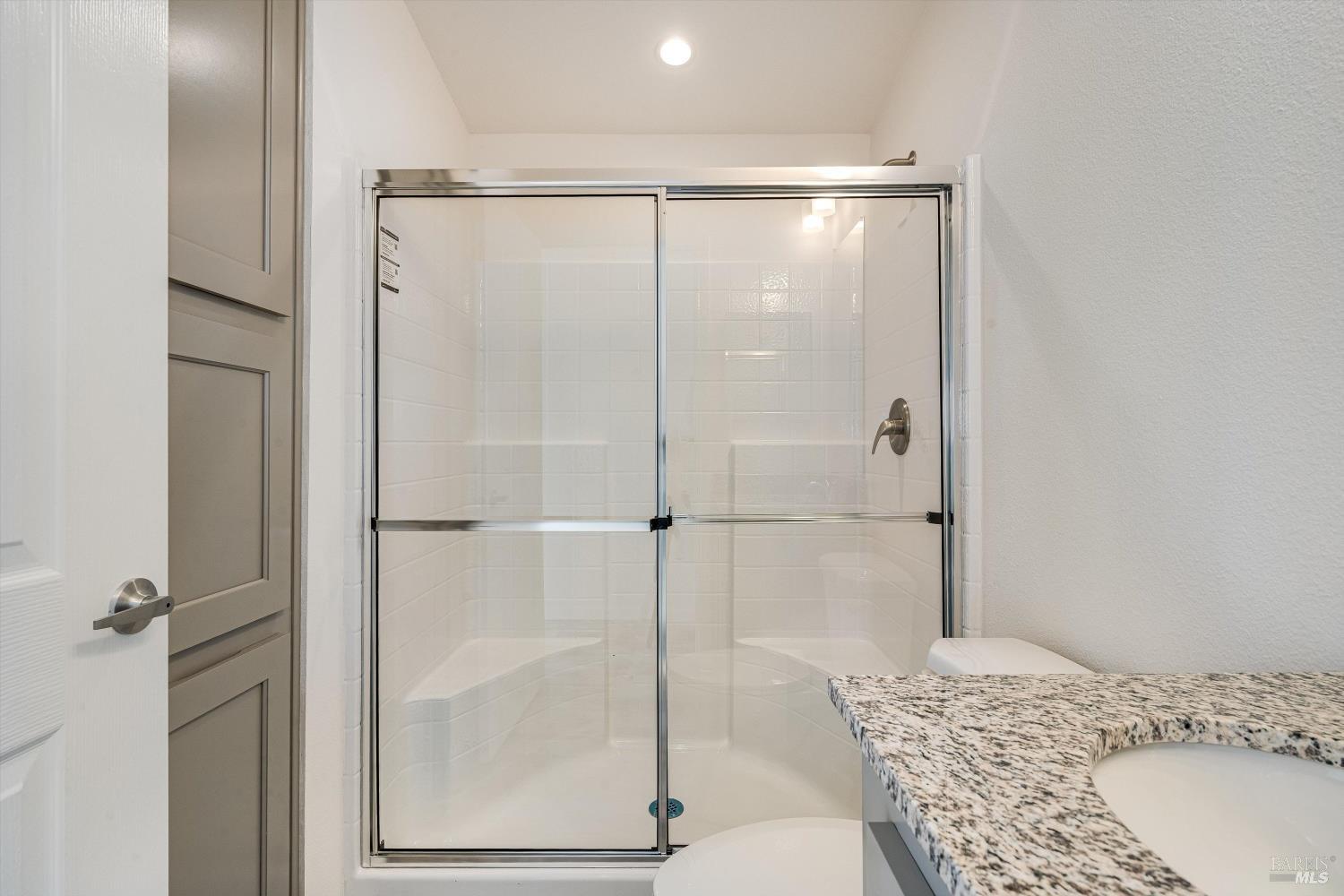 101 Colgan Avenue, Unit 24 Santa Rosa, CA 95404 - Photo 15 of 21 a bathroom with a shower and a sink