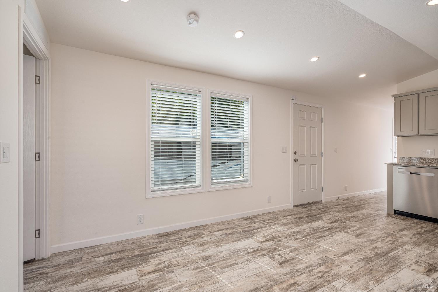 101 Colgan Avenue, Unit 24 Santa Rosa, CA 95404 - Photo 10 of 21 a view of an empty room with a window