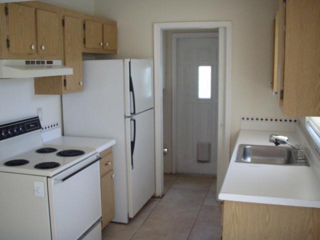 9844 Liberty Road Boca Raton, FL 33434 - Photo 4 of 8 a utility room with sink dryer and washer