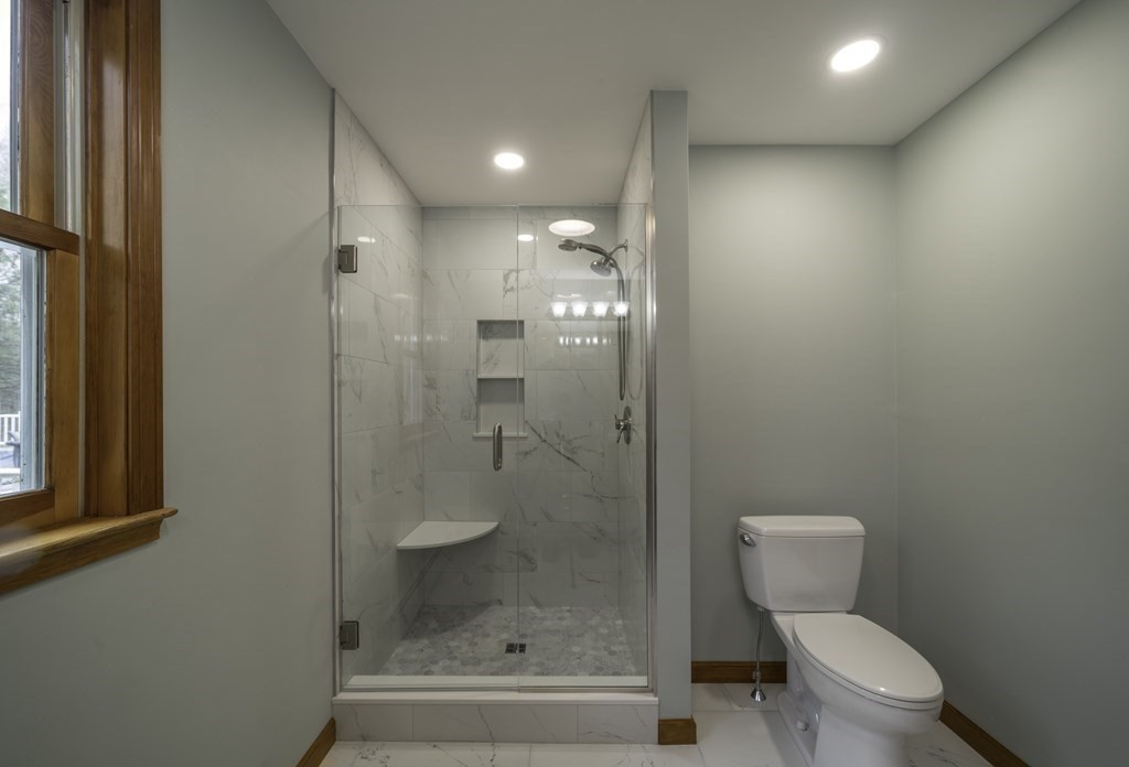 91 Main Road Westhampton, MA 01027 - Photo 20 of 35 a bathroom with a toilet and a shower