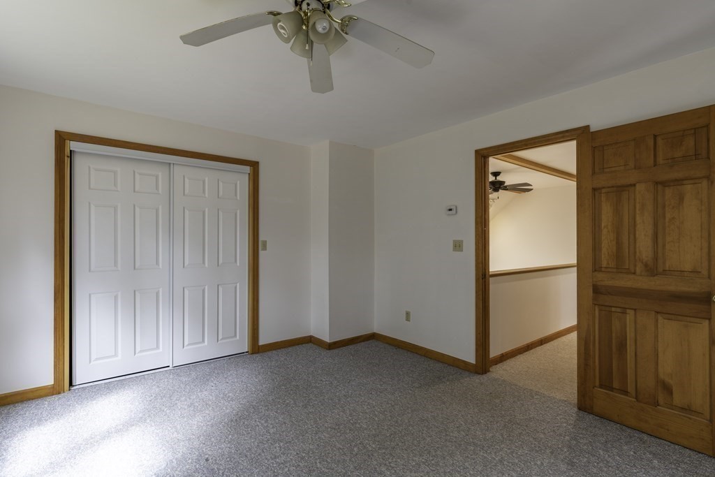 91 Main Road Westhampton, MA 01027 - Photo 22 of 35 a view of an empty room with a cabinet