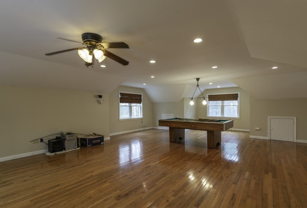 91 Main Road Westhampton, MA 01027 - Photo 28 of 35 a view of an empty room with wooden floor and a ceiling fan