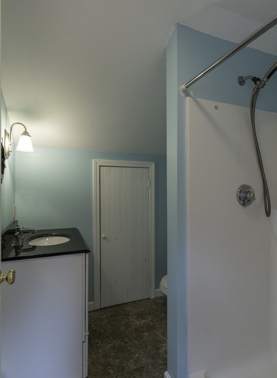 91 Main Road Westhampton, MA 01027 - Photo 29 of 35 a bathroom with a shower and a mirror