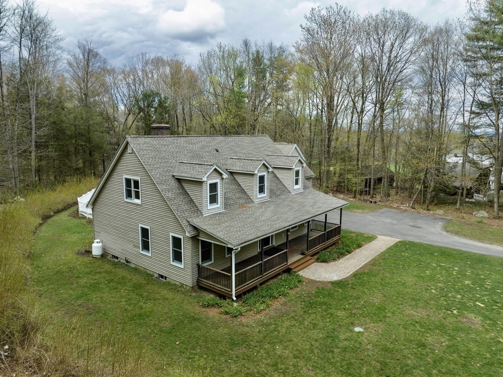 91 Main Road Westhampton, MA 01027 - Photo 3 of 35 a aerial view of a house with pool