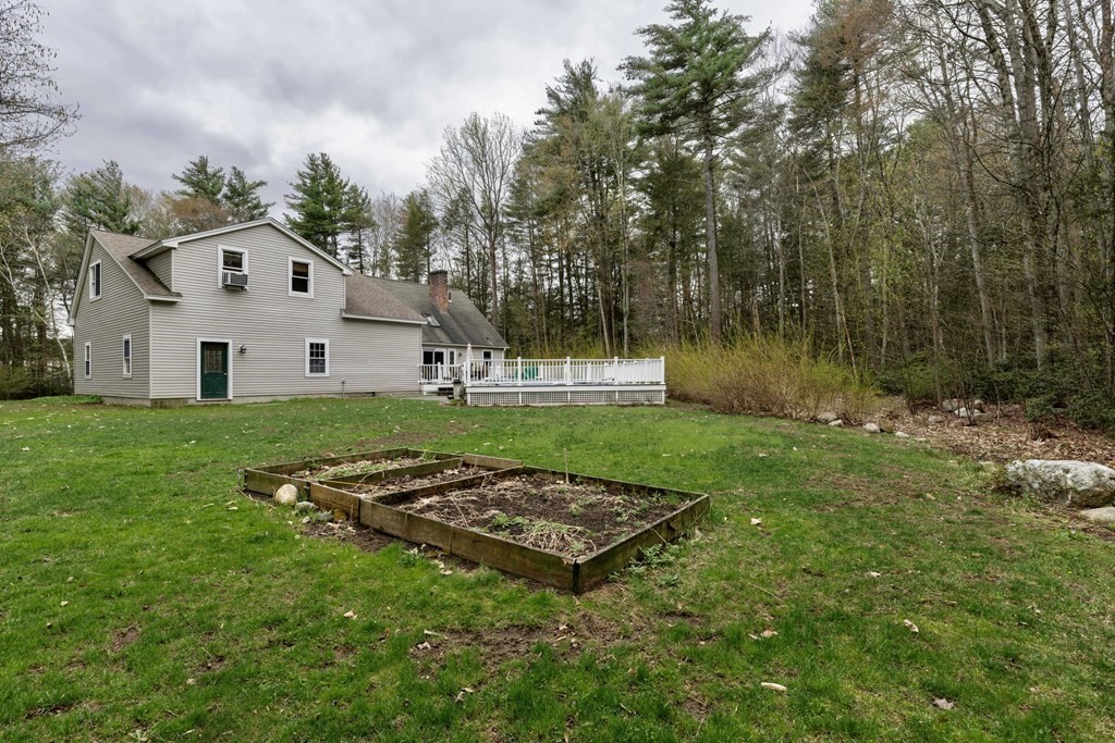 91 Main Road Westhampton, MA 01027 - Photo 32 of 35 a view of a white house with a yard