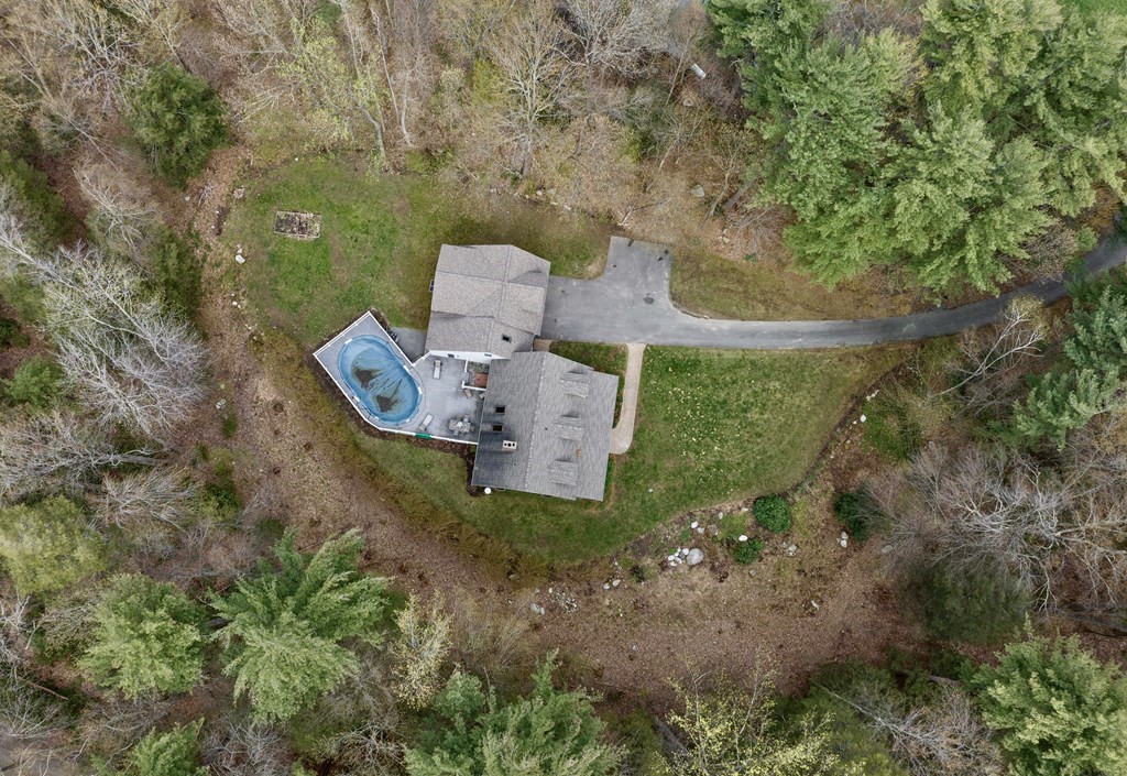 91 Main Road Westhampton, MA 01027 - Photo 4 of 35 a picture of a yard with table and chairs