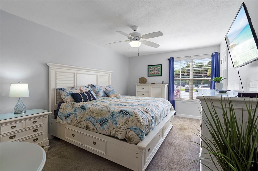 7470 Highway 1, Unit 105 Cocoa, FL 32927 - Photo 19 of 37 a bedroom with bed and window