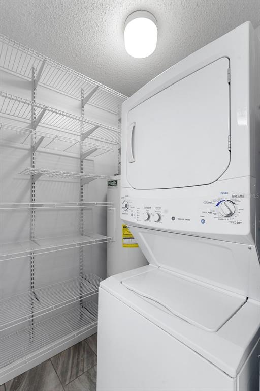 7470 Highway 1, Unit 105 Cocoa, FL 32927 - Photo 26 of 37 a utility room with dryer and washer