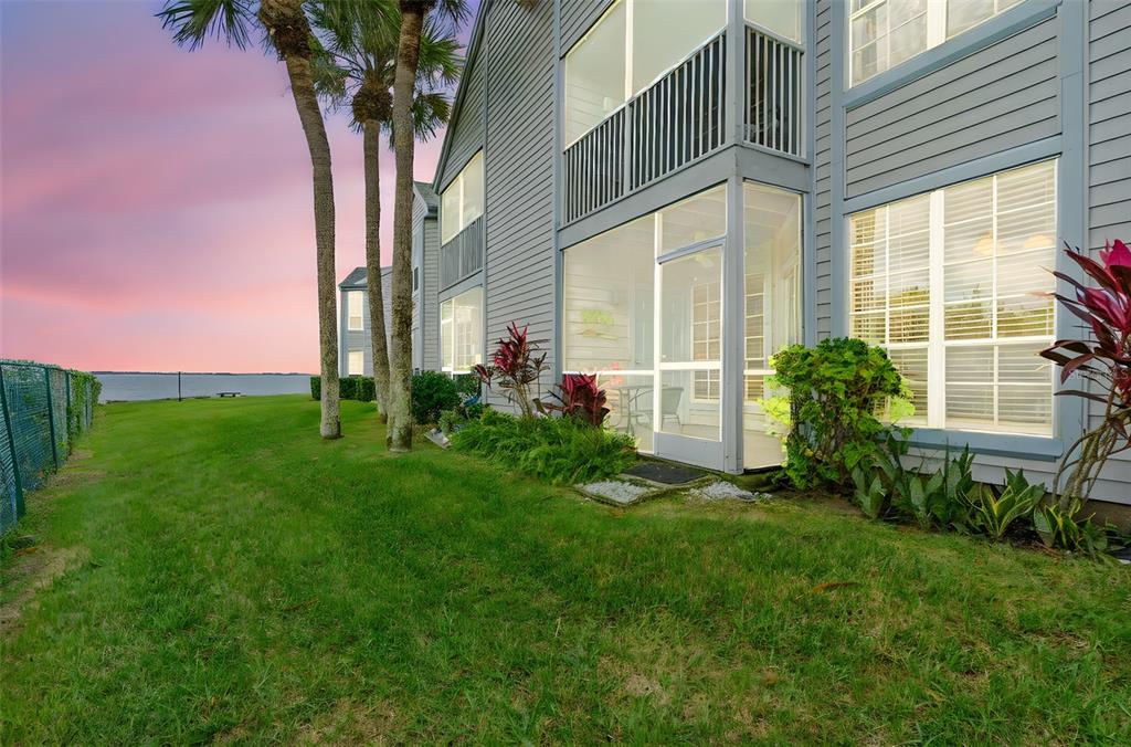 7470 Highway 1, Unit 105 Cocoa, FL 32927 - Photo 5 of 37 a view of a house with a yard and plants