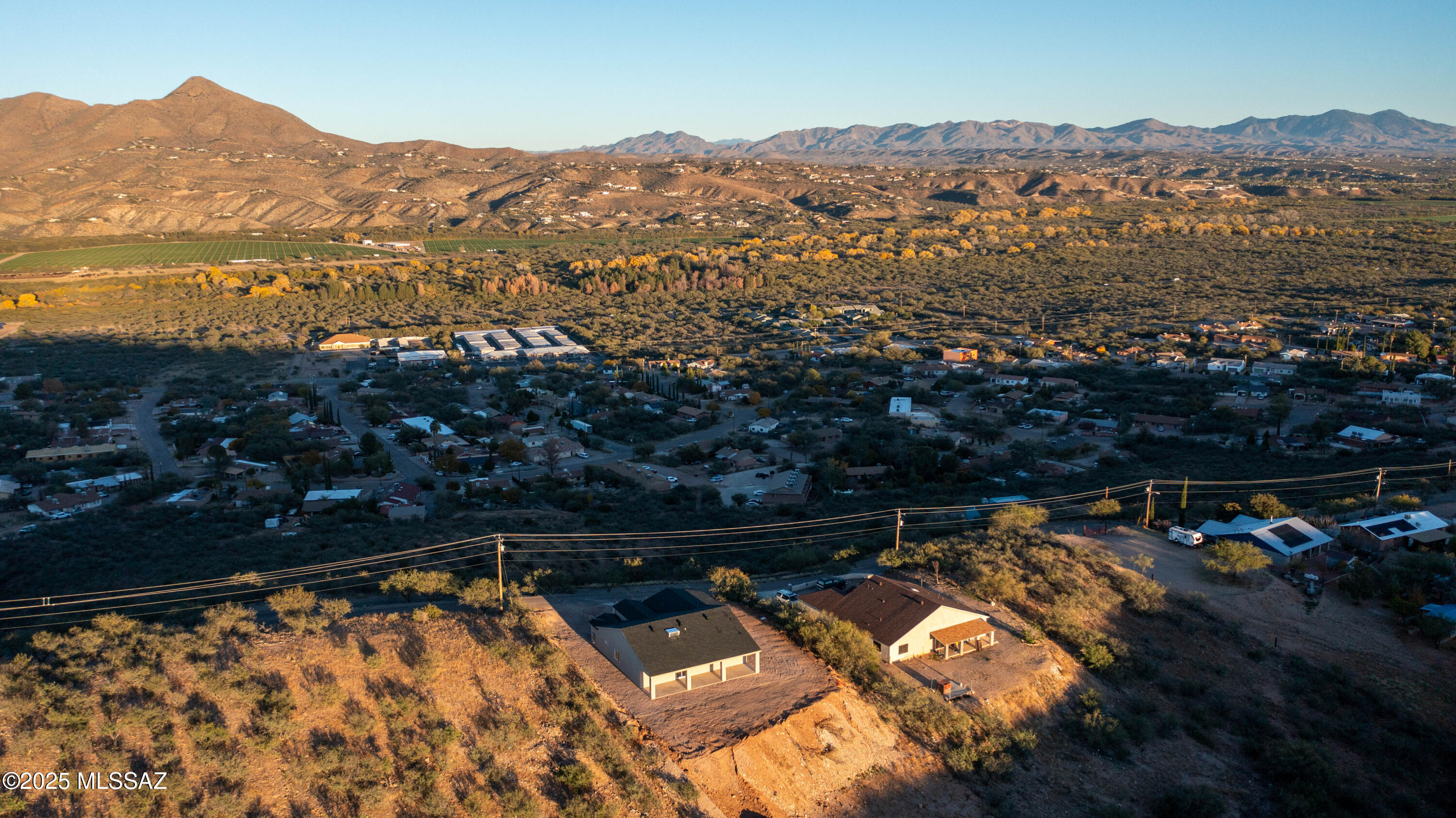 497 Calle Cipres Rio Rico, AZ 85648 - Photo 5 of 50 an aerial view of residential houses with outdoor space