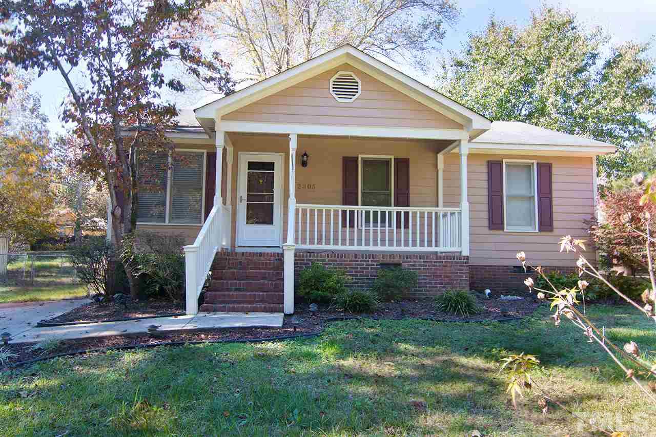2305 Merganzer Road Raleigh, NC 27616 - Photo 1 of 10 a front view of a house with garden