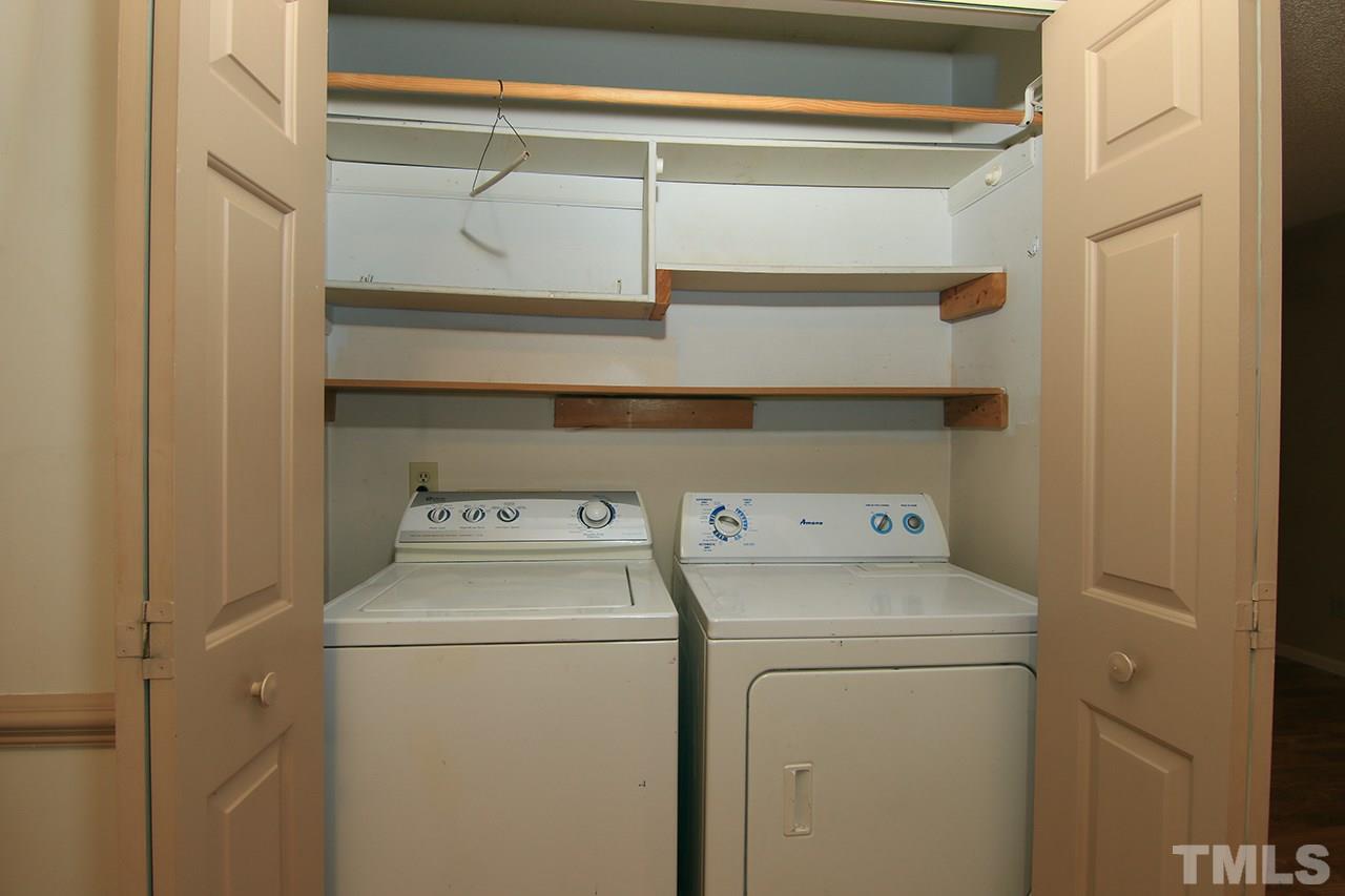 2305 Merganzer Road Raleigh, NC 27616 - Photo 10 of 10 a view of storage and utility room with washer and dryer