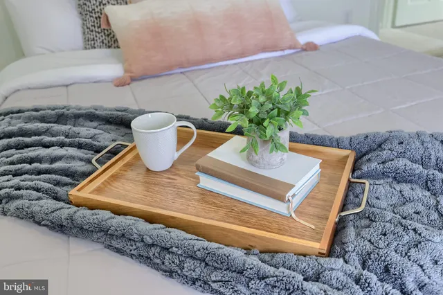 a vase of flowers sitting on a table