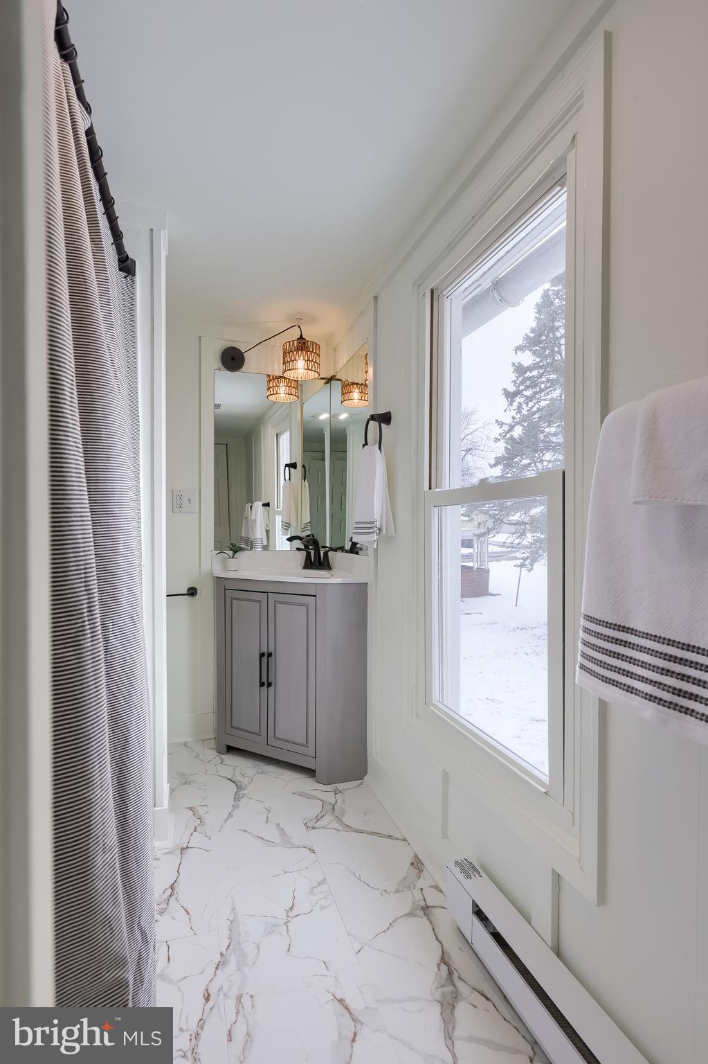 645 South Main Street Red Lion, PA 17356 - Photo 38 of 53 a bathroom with a sink a mirror and a shower