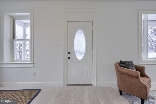 a view of livingroom with furniture and window