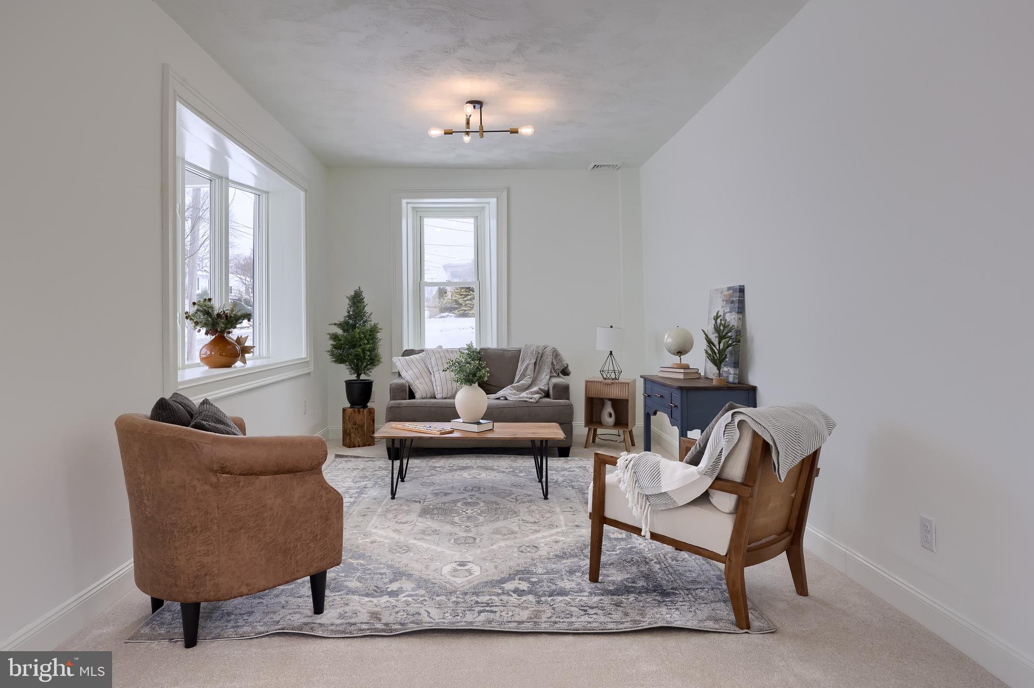 645 South Main Street Red Lion, PA 17356 - Photo 6 of 53 a living room with furniture and a potted plant