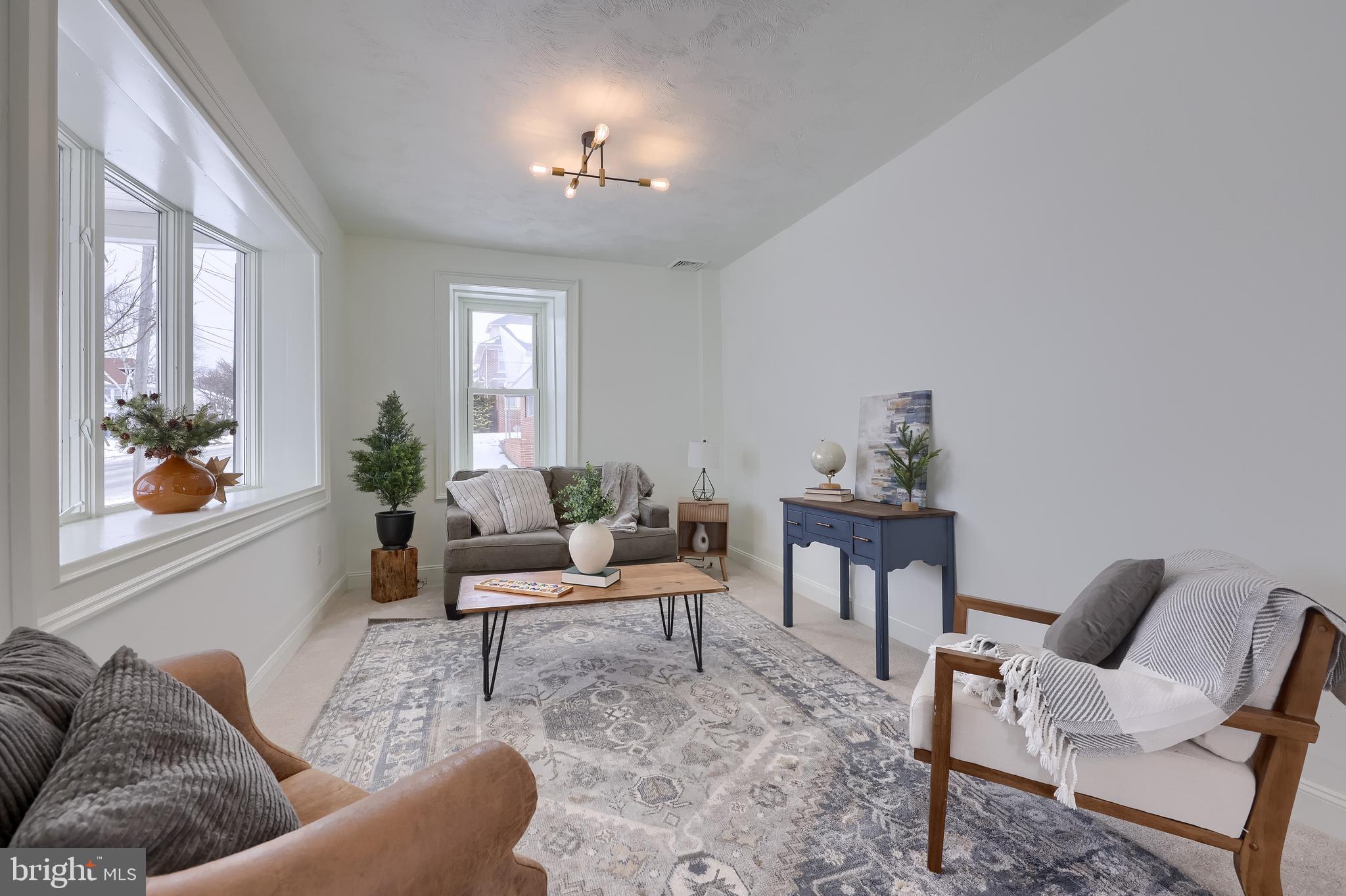 645 South Main Street Red Lion, PA 17356 - Photo 7 of 53 a living room with furniture and a potted plant