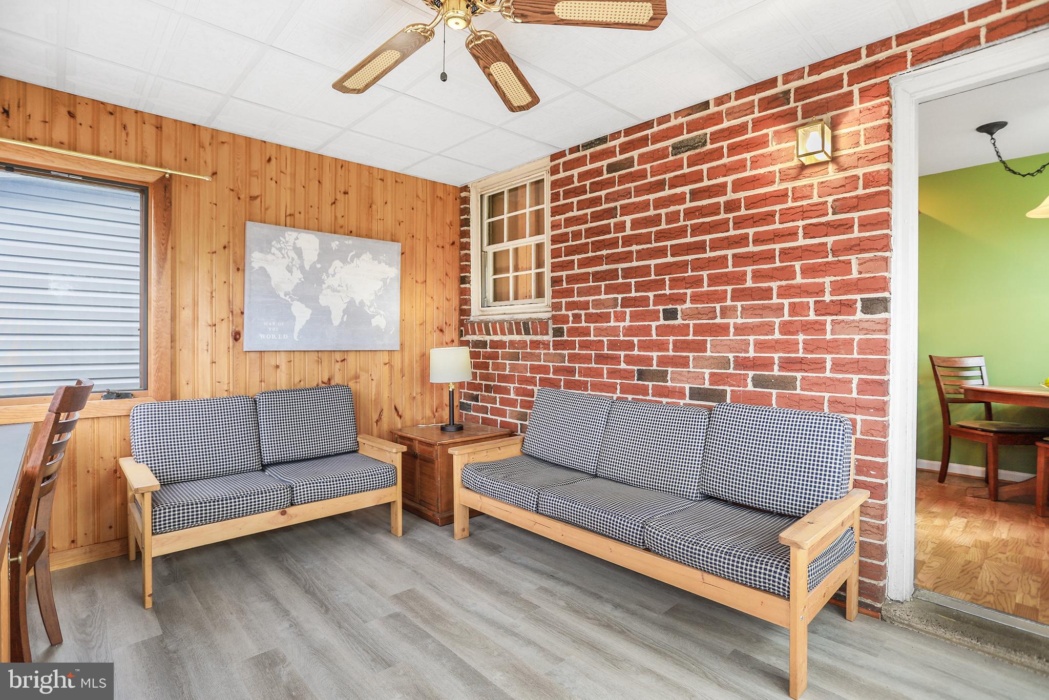 317 East Rodgers Street Ridley Park, PA 19078 - Photo 11 of 24 a living room with furniture and a flat screen tv