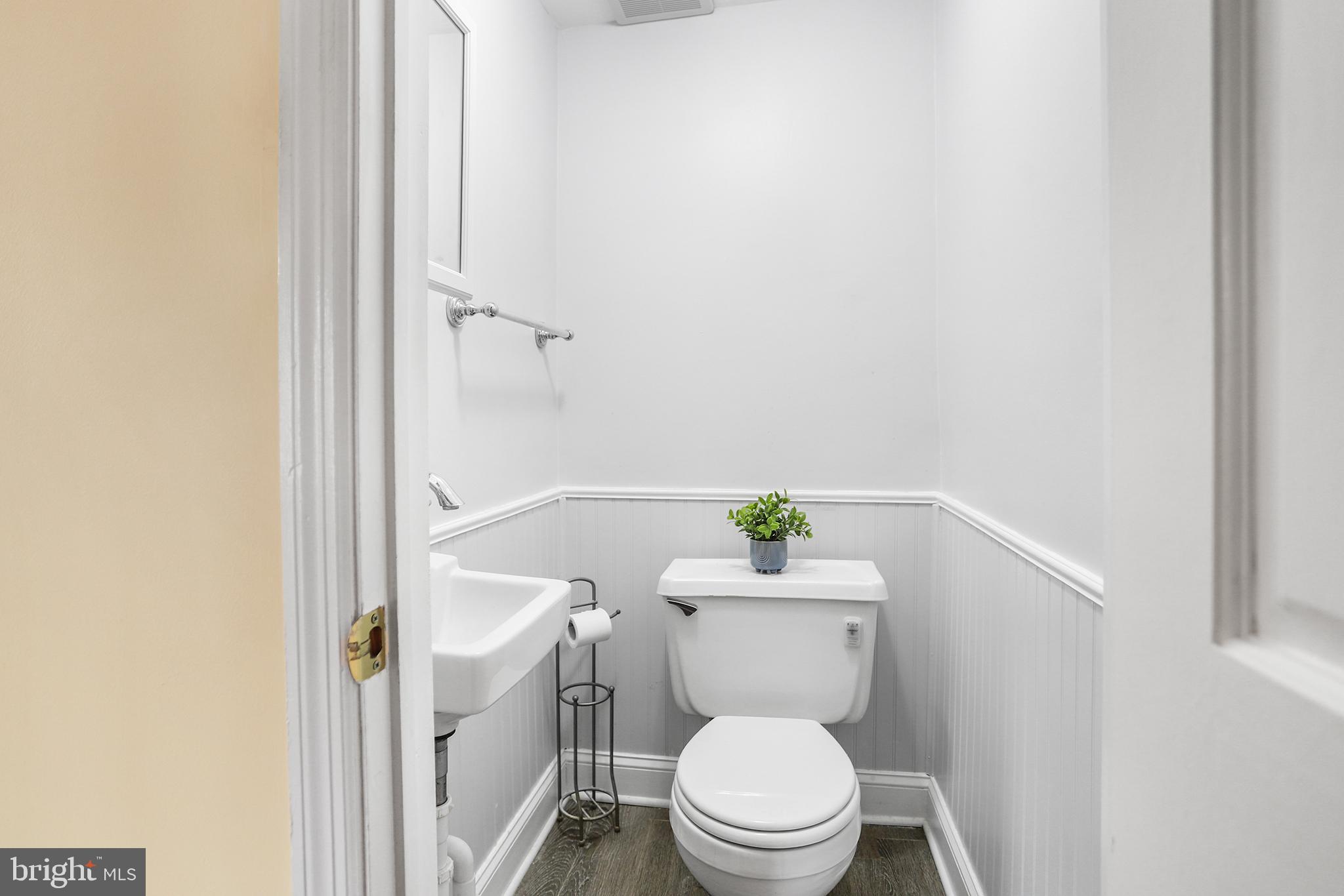 317 East Rodgers Street Ridley Park, PA 19078 - Photo 12 of 24 a white toilet sitting next to a shower