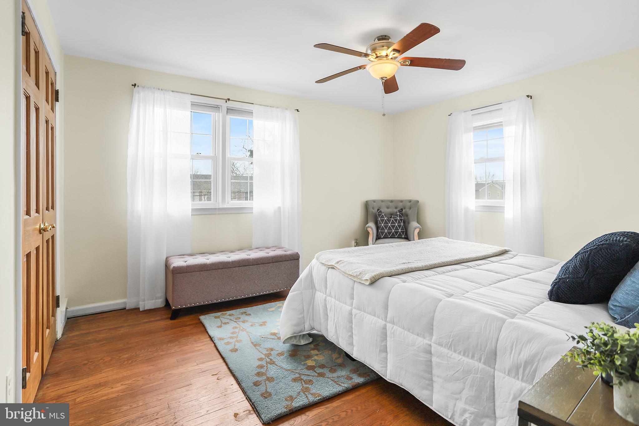 317 East Rodgers Street Ridley Park, PA 19078 - Photo 13 of 24 a bedroom with a bed and a window