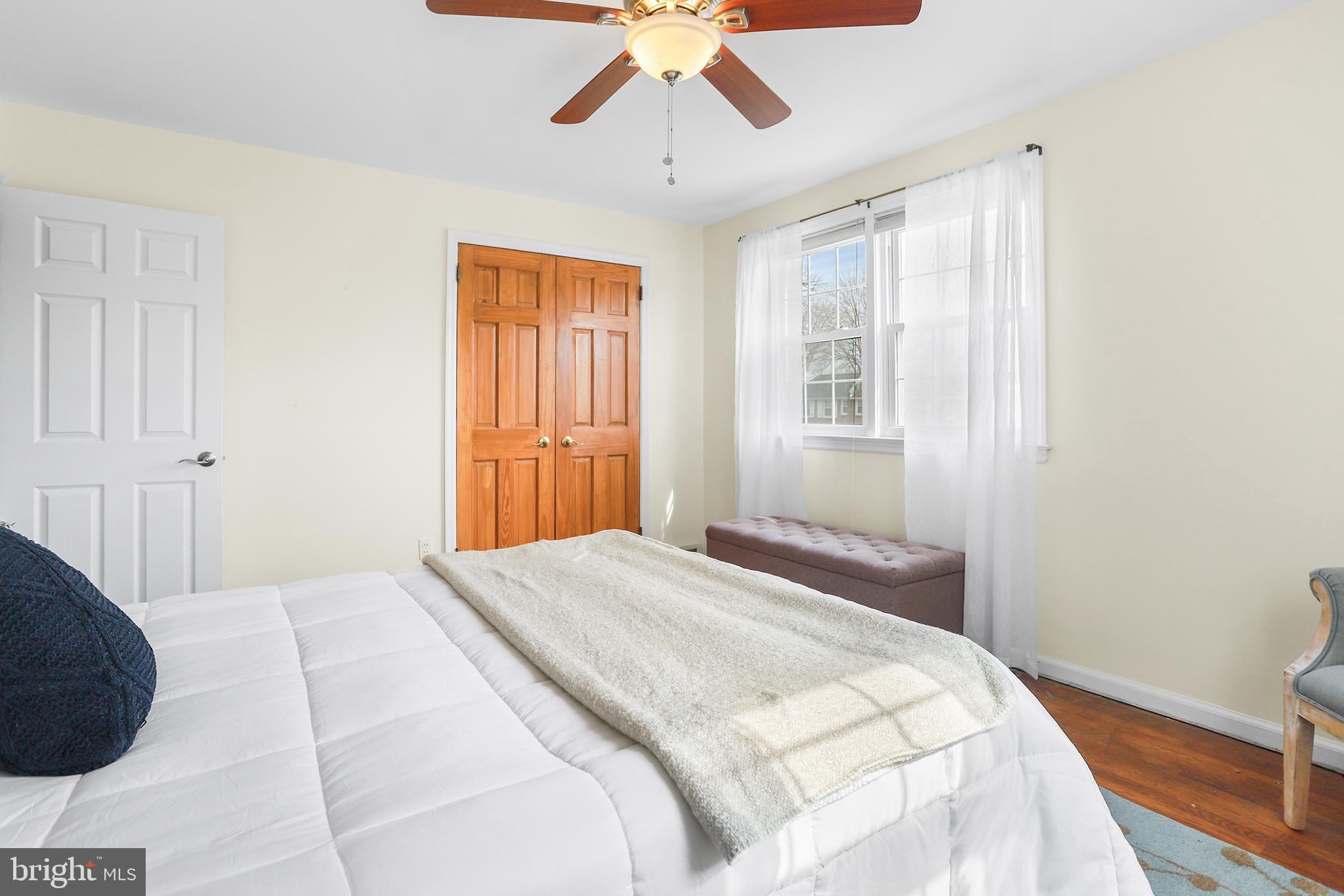 317 East Rodgers Street Ridley Park, PA 19078 - Photo 15 of 24 a bedroom with a bed and a window