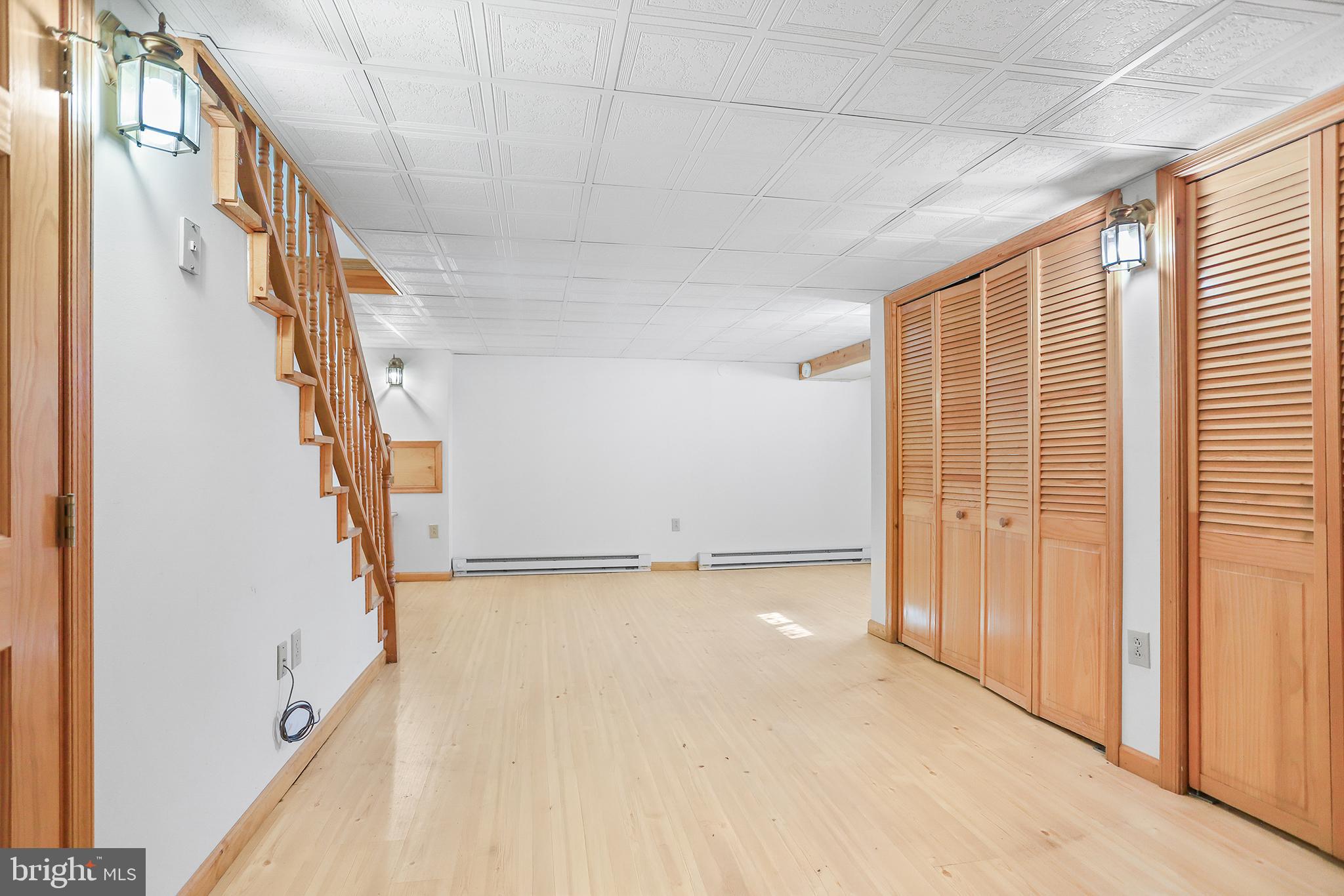 317 East Rodgers Street Ridley Park, PA 19078 - Photo 20 of 24 a view of an empty room with stairs