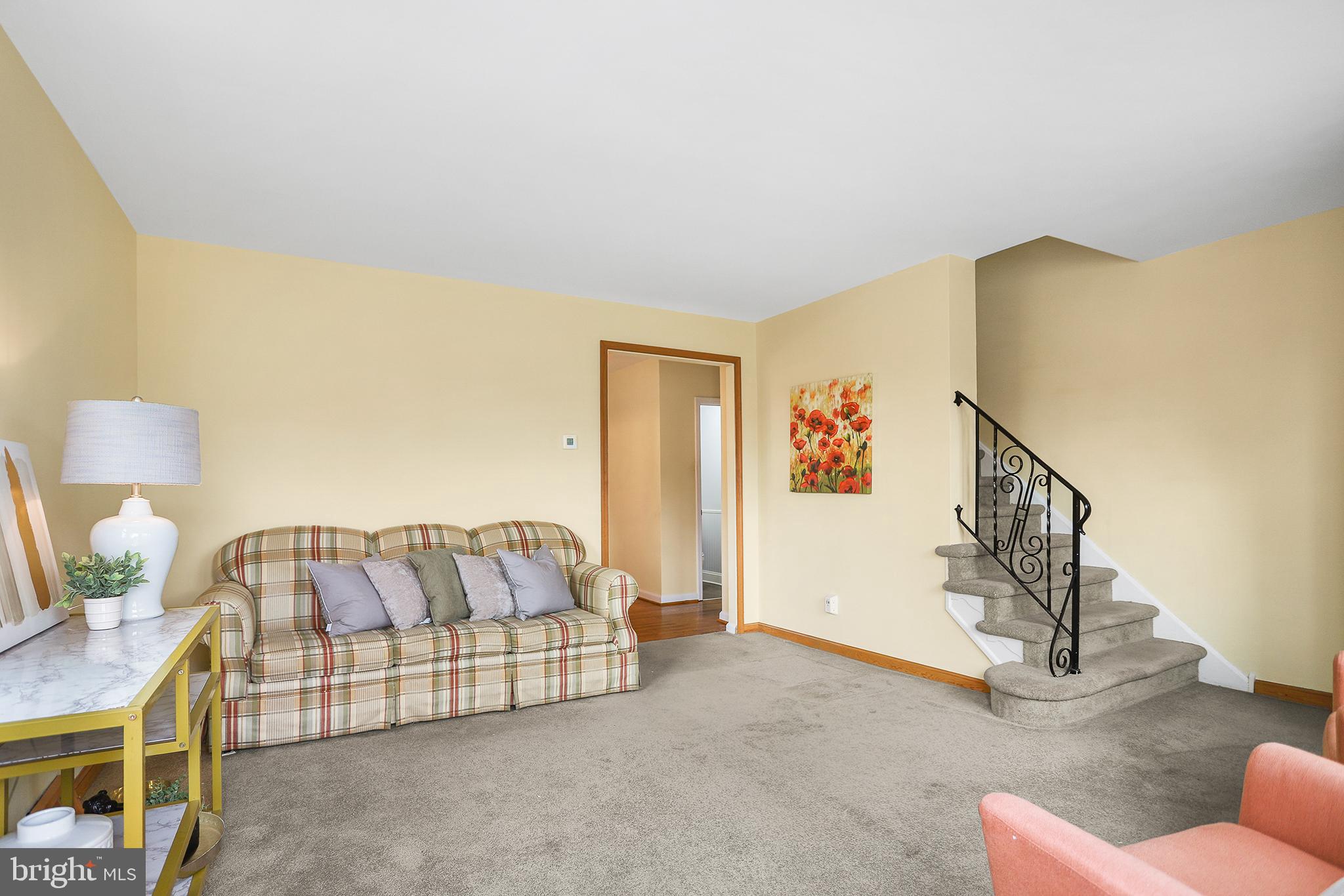 317 East Rodgers Street Ridley Park, PA 19078 - Photo 3 of 24 a living room with furniture and a couch