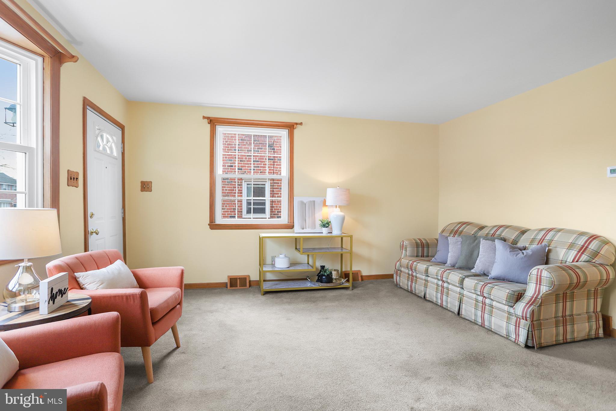 317 East Rodgers Street Ridley Park, PA 19078 - Photo 4 of 24 a living room with furniture and a window