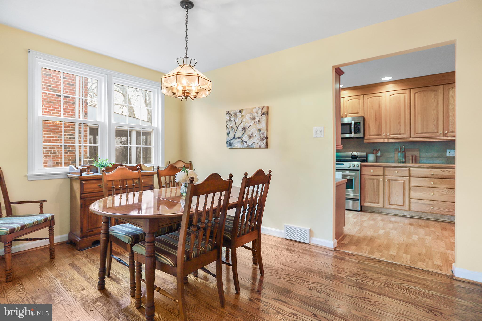 317 East Rodgers Street Ridley Park, PA 19078 - Photo 5 of 24 a view of a dining room with furniture window and wooden floor