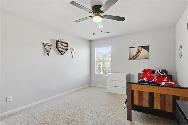 a view of workspace with a window and cabinet