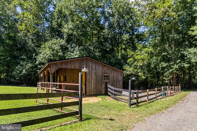 a house that has sitting area in front of it