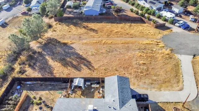a view of balcony with wooden floor and seating space