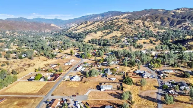 an aerial view of residential house with parking space