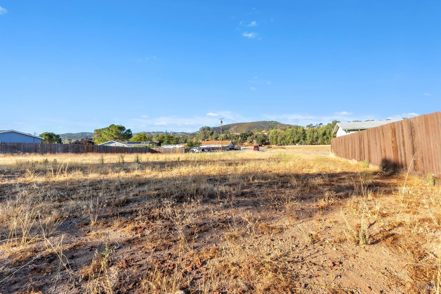 17832 Iris Way Clearlake Oaks, CA 95423 - Photo 33 of 33 a view of a lake with houses in the back